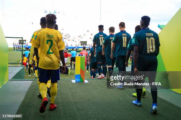 Players of Solomon Islands and Italy lenter to the field ahead the FIFA U-17 Men's World Cup Brazil 2019 group F match between Solomon Islands and...