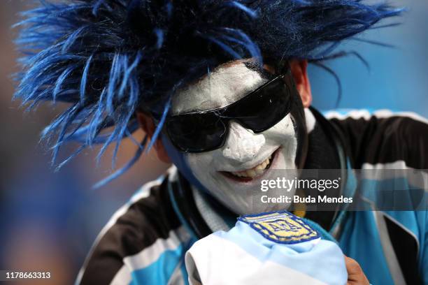 Fan of Gremio looks on before a semi final first leg match between Gremio and Flamengo as part of Copa CONMEBOL Libertadores 2019 at Arena do Gremio...