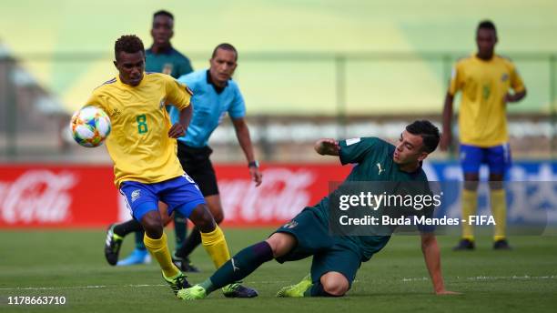 Richie Kwaimamani of Solomon Islands struggles for the ball with Simone Panada of Italy during the FIFA U-17 Men's World Cup Brazil 2019 group F...