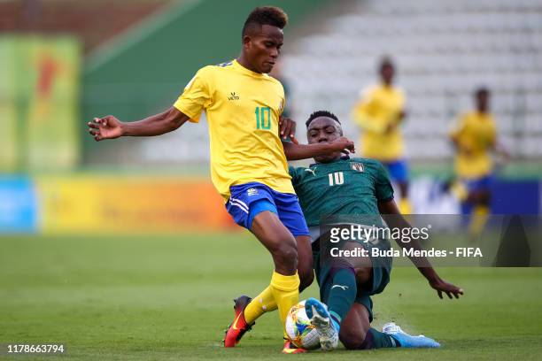 Raphael Leai of Solomon Islands struggles for the ball with Franco Tongya of Italy during the FIFA U-17 Men's World Cup Brazil 2019 group F match...