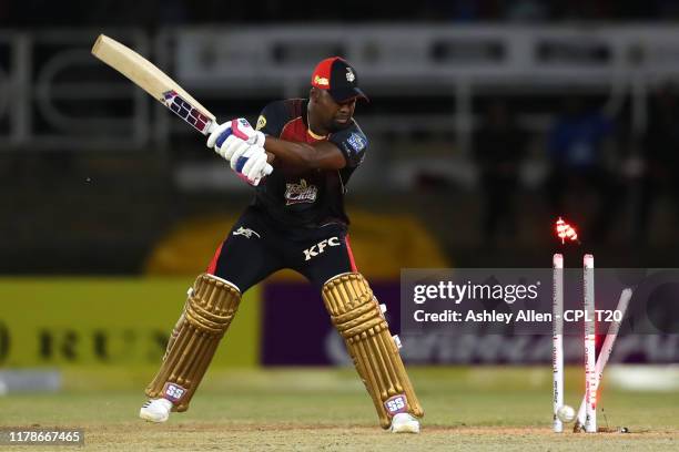 In this handout image provided by CPL T20, Darren Bravo of Trinbago Knight Riders is bowled during the Hero Caribbean Premier League match between...