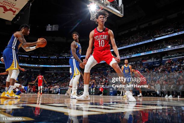 Jaxson Hayes of the New Orleans Pelicans celebrates after a dunk against the Golden State Warriors on October 28, 2019 at the Smoothie King Center in...