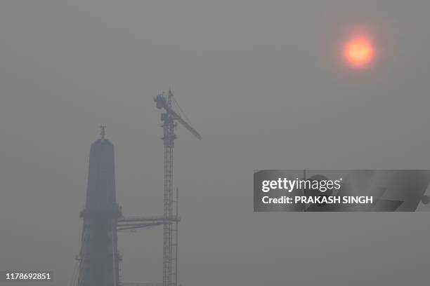 The Signature Bridge over the Yamuna River is seen amidst heavy smog in New Delhi on October 29, 2019.