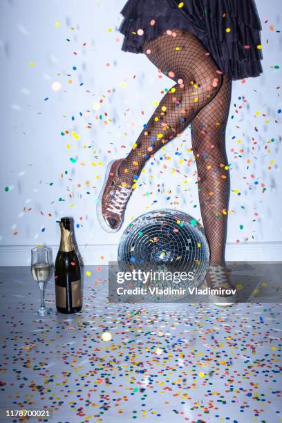 low section of dancing woman and confetti - tights legs stock pictures, royalty-free photos & images