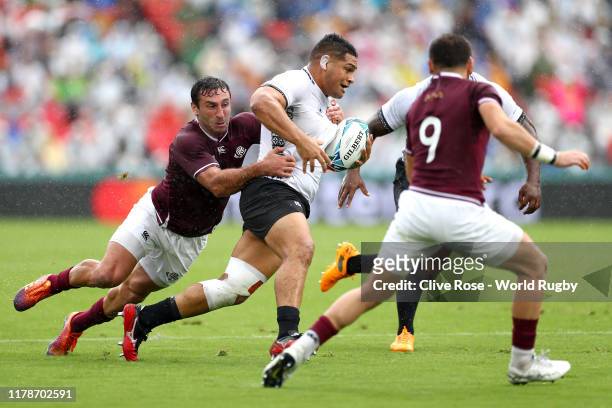 Samuel Matavesi of Fiji is tackled by Alexander Todua of Georgia during the Rugby World Cup 2019 Group D game between Georgia and Fiji at Hanazono...
