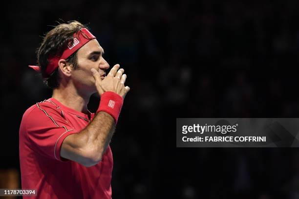 Swiss Roger Federer celebrates his victory during the final match at the Swiss Indoors tennis tournament in Basel on October 27, 2019.