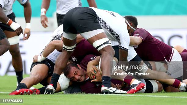 Mamuka Gorgodze of Georgia scores his team's first try during the Rugby World Cup 2019 Group D game between Georgia and Fiji at Hanazono Rugby...