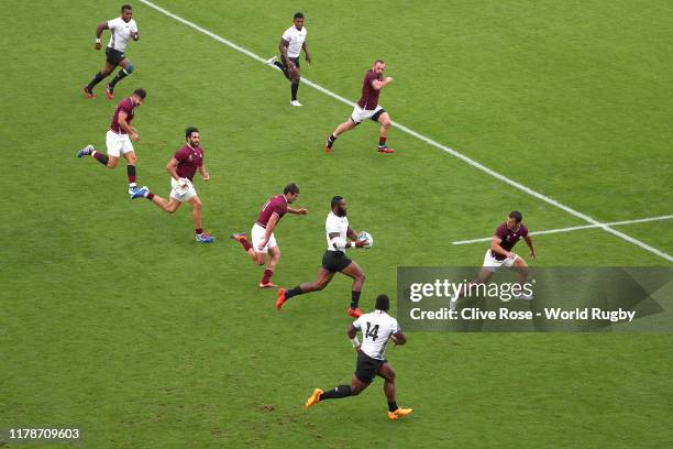 Semi Radradra of Fiji runs with the ball which leads to Josua Tuisova of Fiji scoring his team's third try during the Rugby World Cup 2019 Group D...