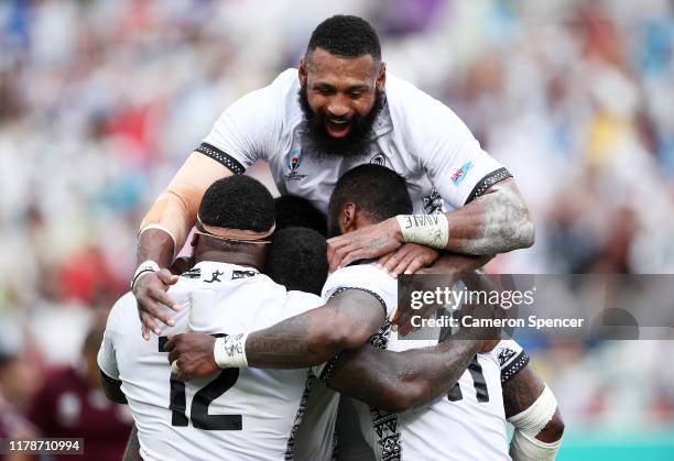 Semi Radradra of Fiji celebrates with teammates after scoring his team's fourth try during the Rugby World Cup 2019 Group D game between Georgia and...