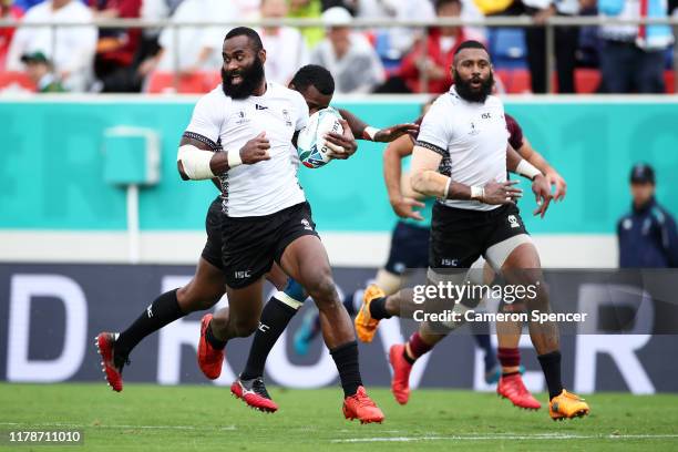 Semi Radradra of Fiji runs with the ball on his way to scoring his team's fourth try during the Rugby World Cup 2019 Group D game between Georgia and...