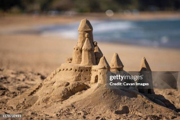 sand castle on beach at hanalei bay, kauai - zandkasteel stockfoto's en -beelden