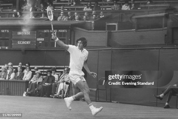 Romanian tennis player Ilie Nastase in action against Cliff Richey of the United States in the second round of the Men's singles tournament at the...