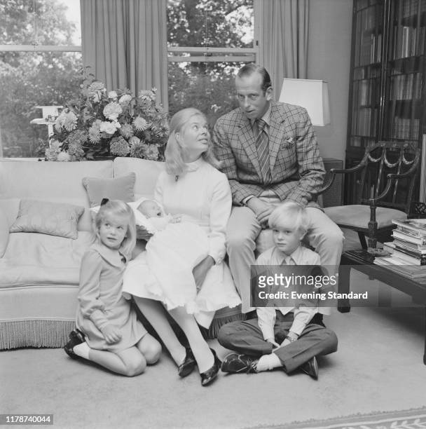 Prince Edward, Duke of Kent and Katharine, Duchess of Kent posed with their children George Windsor, Helen Windsor and baby son Nicholas Windsor at...