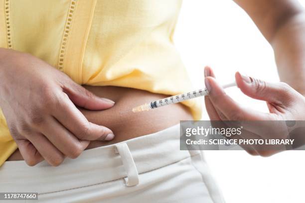 insulin injection - injecting ストックフォトと画像