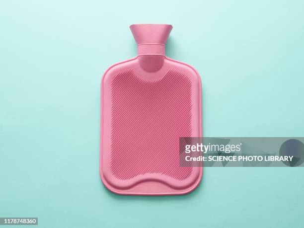 hot water bottle - pms stock pictures, royalty-free photos & images