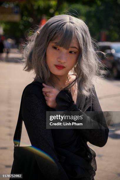 Guest is seen attending the best street style program during Vietnam International Fashion Week on October 29, 2019 in Hanoi, Vietnam.