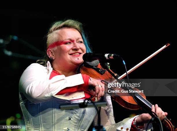 Eliza Carthy joins Richard Thompson on stage at his 70th Birthday Celebration Show the Royal Albert Hall on September 30, 2019 in London, England.