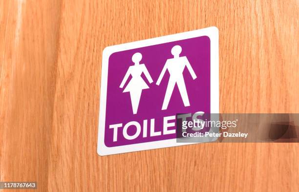 gender neutral toilet door sign - public restroom door stock pictures, royalty-free photos & images