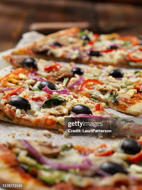 mediterranean flat bread pizza - vegetarian pizza stock pictures, royalty-free photos & images