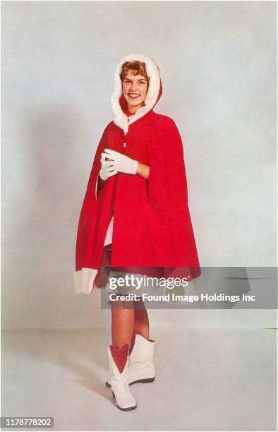 Lady in Santa Claus Cape.