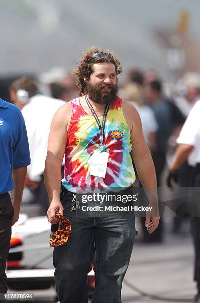 Survivor's Rupert Boneham walks in the pits of the Indianapolis Motor Speedway on Carbueration Day.