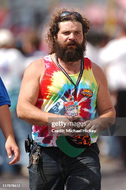 Survivor's Rupert Boneham walks in the pits of the Indianapolis Motor Speedway on Carbueration Day.
