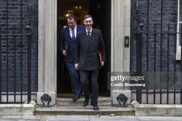 Jacob Rees-Mogg, U.K. Leader of the House of Commons, right, and Mark Spencer, U.K. Parliamentary secretary, depart following a meeting of cabinet...