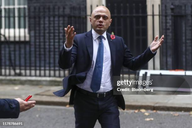 Sajid Javid, U.K. Chancellor of the exchequer, gestures as he departs following a meeting of cabinet ministers in number 10 Downing Street in London,...