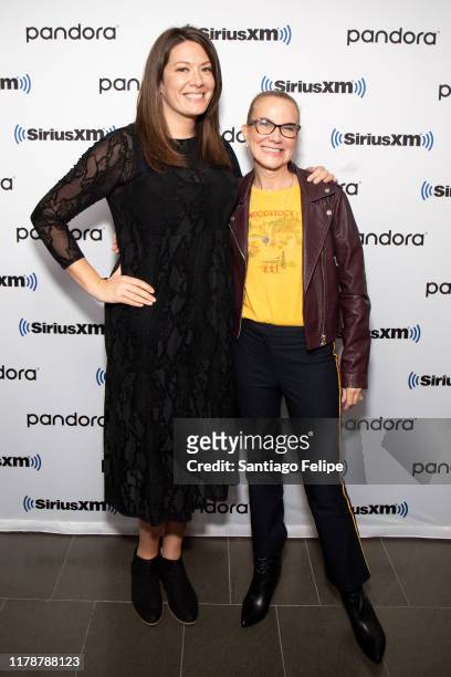 Michelle Collins and Jeannie Gaffigan visits SiriusXM Studios on October 03, 2019 in New York City.
