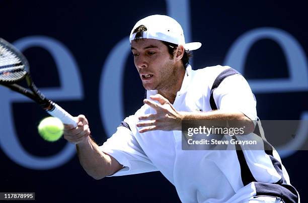 Sebastien Grosjean returns a shot to Jack Brasington in the second round of the 2002 Mercedes-Benz Cup. Grosjean defeated Brasington 6-1, 6-2.