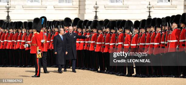 Mexican President Felipe Calderón and the Duke of Edinburgh inspect the guard of honour on Horseguards Parade on the first day of the Mexican...