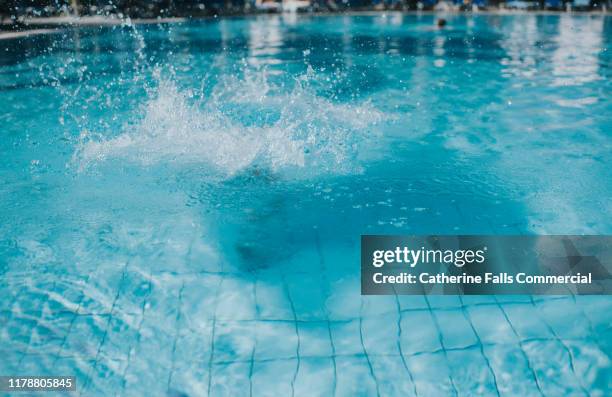 splash! - cannon ball pool stock pictures, royalty-free photos & images