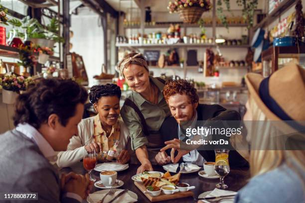 restaurant eating - dining stock pictures, royalty-free photos & images