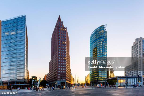 potsdamer platz and modern office buildings in berlin, germany - postdamer platz stock-fotos und bilder