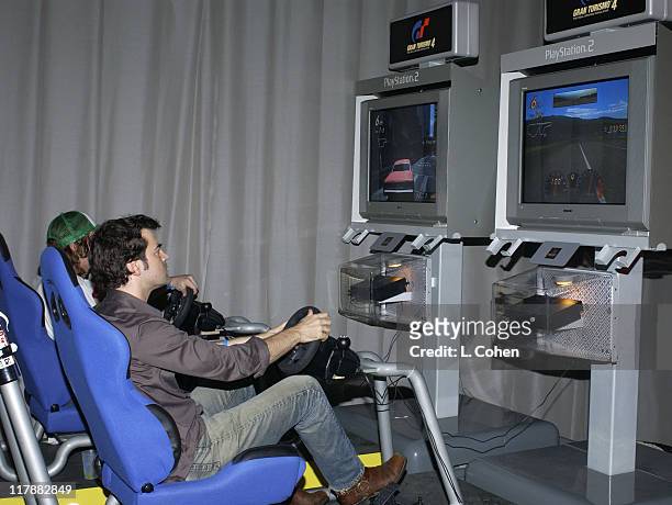 Ron Livingston driving Gran Turismo 4 during PlayStation 2 and Mark Wahlberg Host Celebrity Gaming Tournament for Charity - Inside at Club Ivar in...