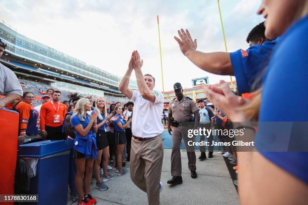 Dan Mullen head coach of the Florida Gators greets fans after a game against the Towson Tigers at Ben Hill Griffin Stadium on September 28, 2019 in...