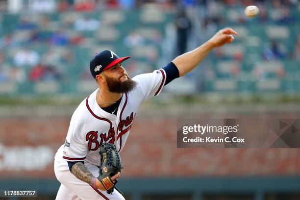 Dallas Keuchel of the Atlanta Braves delivers the pitch against the St. Louis Cardinals during the first inning in game one of the National League...