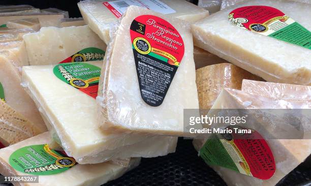 Parmigiano Reggiano and other cheese from Italy is displayed for sale in a grocery store on October 3, 2019 in Los Angeles, California. The Trump...