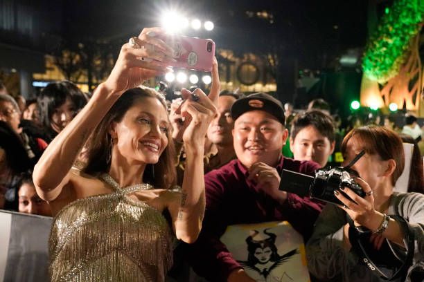 Angelina Jolie interacts with fans at the Japan premiere of 'Maleficent: Mistress of Evil' on October 03, 2019 in Tokyo, Japan.