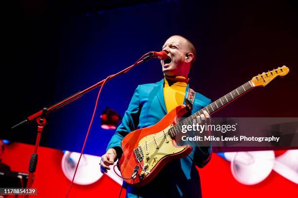Alex Trimble of Two Door Cinema Club performs on stage at Motorpoint Arena on October 03, 2019 in Cardiff, Wales.