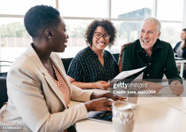 financial planning for early retirement - workplace diversity stock pictures, royalty-free photos & images