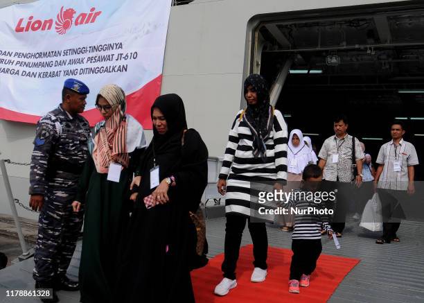 Families of victims of the Lion Air JT 610 plane crash out of the KRI Semarang 594 after a procession of flowering at the crash site of Lion Air at...