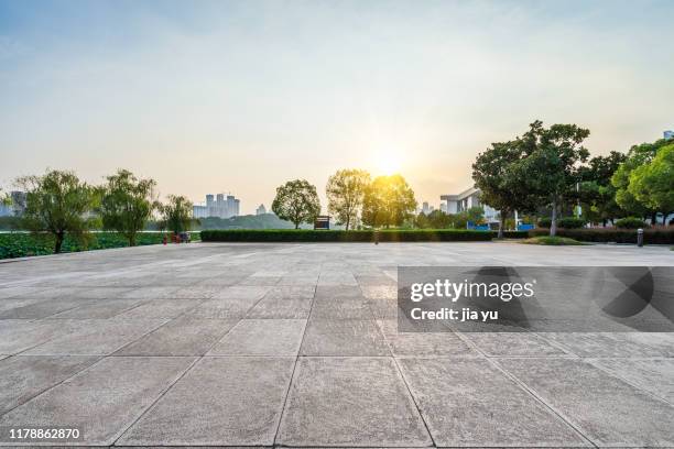 open area against sunset sky - sidewalk ストックフォトと画像