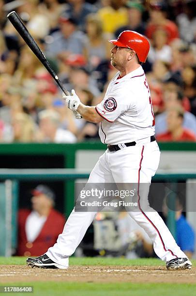 Matt Stairs of the Washington Nationals hits a single in the ninth inning to drive in the winning run against the Pittsburgh Pirates at Nationals...