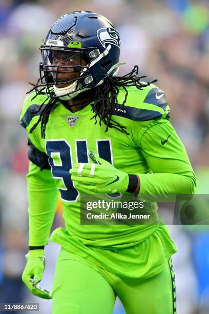 Ezekiel Ansah of the Seattle Seahawks runs off the field during the game against the Los Angeles Rams at CenturyLink Field on October 03, 2019 in...