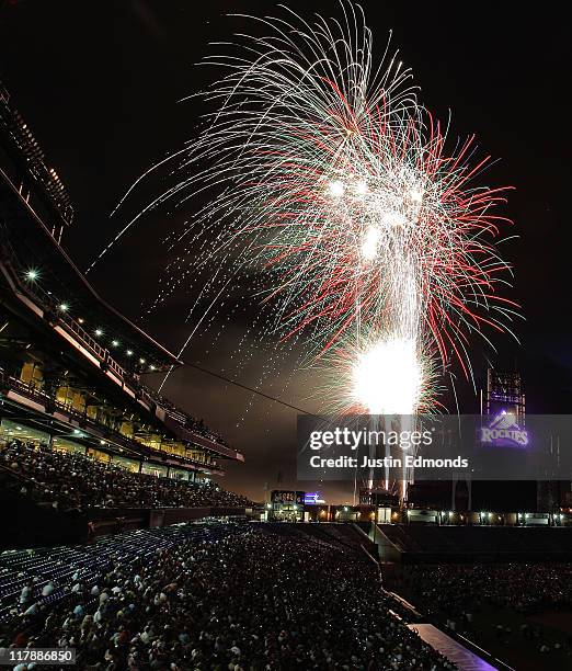 Fireworks explode over the stadium after a game between the Kansas City Royals and Colorado Rockies at Coors Field on July 1, 2011 in Denver,...