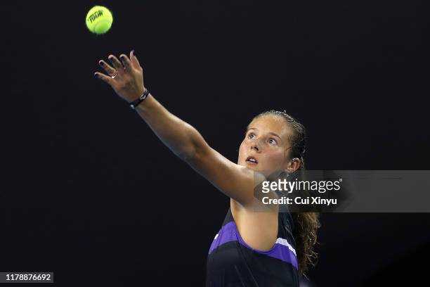 Daria Kasatkina of Russia serves to Ekaterina Alexandrova of Russia during the Women's singles third round of 2019 China Open at the China National...