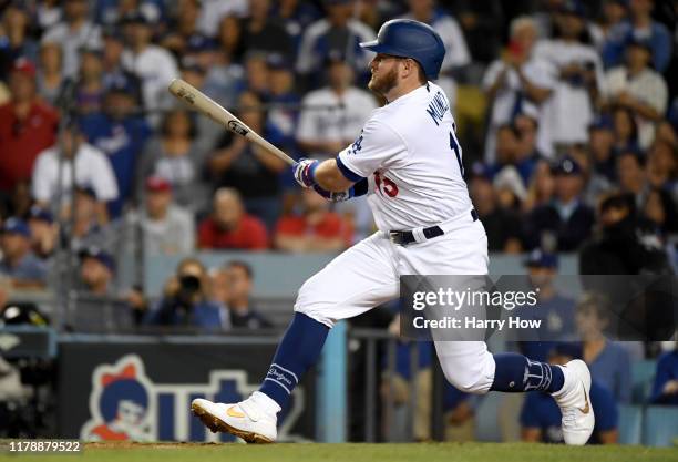 Max Muncy of the Los Angeles Dodgers hits a two run RBI single in the seventh inning of game one of the National League Division Series against the...