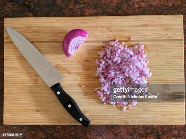 red onion chopped - cutting red onion stock pictures, royalty-free photos & images