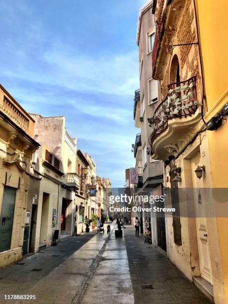 looking along carrer de sant pere - badalona stock pictures, royalty-free photos & images